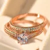 Set di fedi nuziali in zircone di cristallo femminile di lusso Set di gioielli in oro rosa 18KT Promise Love Engagement Rings For Women Band