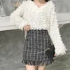 Women Woolen Mini Skirt Autumn Winter Vintage Straight Plaid Tassel Skater Skirt High Waist Femininas 210527