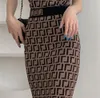 مصمم المرأة فساتين أنيقة سلسلة إلكتروني حزب اللباس المرأة أزياء نصف طول تنورة بلون متماسكة الخطوة حزمة الورك قصيرة الحجم S-XL