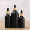 Essential Oil Bottle Matte Black Glass e liquid Essential Oil Perfume Bottles with Reagent Pipette Dropper and Wood Grain Cap DHL