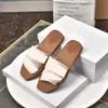 2022 Top Frauen Woody Mules Hausschuhe Designer Canvas Kreuz gewebte Sandalen Sommer Outdoor Peep Toe Casual Slipper Brief Stilistische Schuhe mit Box