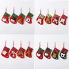 Calze di Natale Calzini Piccoli Sacchetti regalo Ornamento Bambini Sacchetto di caramelle Ciondolo e decorazione su albero di Natale con simpatico cartone animato