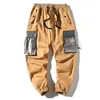 Pantalones de hip hop hombres 2020 nueva moda casual algodón costura color joggers pantalones bolsillo streetwear pantalones hombre 4xl y0927