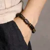 Handverarbeitete Stränge, Streifen-Ebenholz-Armband, altes gehämmertes Kupfer, konkav-konvexe Textur, schwarzes Holz, Schmuck für Männer und Frauen, individueller Armreif