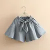 Summer Casual Design 3 4 5 6 7 8 9 10 12 anni Cotone Bianco Blu Culotte corte Pantaloncini con fiocco per bambini Bambina 210529