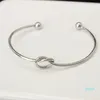 الأساور المعدنية الأوروبية والأمريكية معقود أساور النساء ببراكيليتس Lovebracelets مجوهرات اليد المفتوحة.