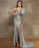 2023 Evening Dresses Wear Silver Mermaid Long Sleeves Illusion Crystal Beading High Side Split Floor Length Party Dress Prom Gowns Open Back Robes De