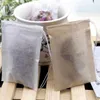 100個/ロットティーストレーナーツールフィルターバッグ自然な未漂白木製パルプペーパーコーヒーバッグ使い捨て可能な注入者茶色巾着6 * 8cm