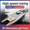 24G Radio Remote Control Boat High Speed ​​Rowing 74V kapacitet Batteri Dual Motor RC Boat 30 km per timme Leksaker för barn Giftg4 21033840022