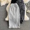 女性ニットスカートセクシーな巾着ruched不規則なMidiファッションストリートウェア固体高弾性ウエストパーティークラブ210603