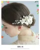 ヘッドピーストレンディシルバーフラワーヘッドジュエリー手作りの結婚式のヘアアクセサリー女性ヘアクリップ花嫁の女の子ヘッドドレスのためのヘアクリップ