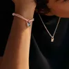 Bracelet de corde en nylon tressé fait à la main pour femmes et hommes en acier inoxydable