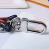 Cartoon Keychains Luxus Designer Mode Keychain Splitterschlüssel Schnalle Echtes Leder Blau Hai Anhänger Brief Mens Womens Taschen Ornamente