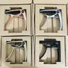 Legering Guitar Capo Justerbart klipp för gitarrfolk och elektriska gitarrer Capos med Box1221483