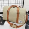 Nova lona sacos de viagem dos homens das mulheres grande capacidade dobrável duffle saco organizador embalagem cubos bagagem menina fim de semana bag309b247v