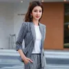 Pantaloni a due pezzi da donna Autunn Fashion Corea Abito da donna Mezza manica Giacca a righe slim Top e abbigliamento Donna Set LS098