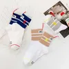 Personality Sewn label pendant casual socks cotton medium tube socks men's and women's sports socks