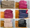 Leren Felicie-tas met reliëf voor damesportemonnees Effen kleur Pochette Felicia multifunctionele clutch bags
