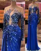 2021 Plus Size Arabo Aso Ebi Royal Blue Abiti da ballo di lusso Cristalli di perline Sheer Neck Evening Formal Party Second Reception Gowns Dress ZJ595