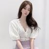 Women Sweater Summer Korean Chic Girl Elegant Temperament Wavy Side V-Neck Edging Puff Sleeve Hollow Knit Cardigan 210514