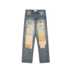 Jeans da uomo High street con lo stesso micro corno sciolto patch di giunzione casual barba di gatto jeans tagliati in modo irregolare