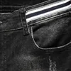 Jeans da uomo in stile europeo Casual Bellezza Donna Stampa Pantaloni da uomo in denim Pantaloni a matita neri sottili