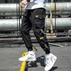 Spring Hip Hop Joggers Men Black Harem Pants Multi-Pocket Ribbons Man Sweatpants Streetwear Casual Mens Pants M-3XL 211201