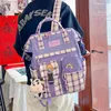 ヴィンテージカジュアルな女性の格子縞の紫色のバックパックファッション黒牛柄旅行袋Backpack School 210911