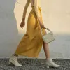PU Läder Split kjol för kvinnor Hög midja Sashes Solid Minimalistiska Midi Kjolar Kvinna Vår Fashion 210521