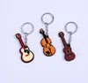 2021 Fashion Classic Guitar Keychain Silicone Key Ring Musikinstrument Hängsmycke Tillbehör till Man Kvinnorgåva