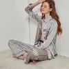 Conjuntos de pijamas de invierno para mujeres Stripas sexy satinados Pjamas 2 piezas Set Elegante de lujo Moda Loungewear Ropa de casa Regalo de Navidad H1112