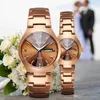 Lovers Gold Watch Fashion Quartz Clothes Watches Män avslappnad och kvinnor klär clockunisex lysande par armbandsur vattentät219k