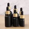 Essential Oil Bottle Matte Black Glass e liquid Essential Oil Perfume Bottles with Reagent Pipette Dropper and Wood Grain Cap DHL