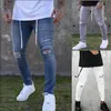 Mannen effen kleur mode strakke jeans sexy casual gat ripped ontwerp streetwear borduurpotlood broek mannen enkel rits slanke jeans x0621