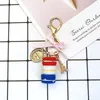 Смола макарон -ключ -мачины Lovely Macaroon Bag Charm Chaveiro Llaveros Gold Metal Keyring Care Holder