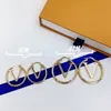 Moda Kobiety Hoops Kolczyki Designer Duże Krążki Proste Kolczyki Dla Kobiet Luksusowa Biżuteria List Miłość Złoto Uszy Studs Rozmiar 3-5 cm