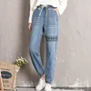 Женские джинсы Негабаритные джинсовые джинсы L-8xl Женщины с укороченными штаны, вышитые свободные тонкие ноги и высокий талию повседневного повального плюс плюс.