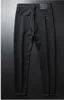 고품질 망 디자이너 Luxurys 청바지 블랙 화이트 A 쌍 판매 고민 된 비즈니스 캐주얼 스트리트 착용 남자 바지 슬림 레그 적합 찢어진 구멍 스트라이프 유명한 바지 W40