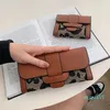 Kvinnor Väska Retro Vävd Lång Plånbok Personifierad Håled Out Brand Plånböcker Fashion Embossed Leather Womens Handbag Folding