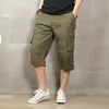 Högkvalitativ sommar Mäns Baggy Multi Pocket Military Short Cargo Byxor Breeches Male Long Men Tactical Plus Storlek 6XL Shorts