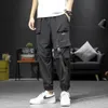2020 уличная одежда хип-хоп черный гарем брюки мужчины эластичные талии панк брюки с лентами тонкие брюки джоггер мужчины мужские хип-хоп брюки Y0927
