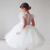 Suknie Dziewczyny Ins Boho Dziecko Dziewczyny Biała Druhna Dress Dla Dzieci Flutle Rękaw Siatki Tulle Księżniczka Kwiat Odzież Ślub