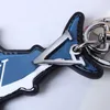 Trousquette de dessin animé de luxe design de luxe Keychain Sliver Keys Boucle En cuir véritable Bleu Shark Pendentif Lettre Mens Femme Sacs Ornements