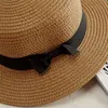 Chapéus de aba larga Mulheres chapéu de verão fita fita bowknot de cor sólida redonda redonda palha plana tampa de sol eger22
