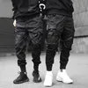 Kowlosz Mężczyźni Wstążki Streetwear Spodnie Cargo Jesień Hip Hop Joggers Spodnie Kombinezony Czarne Fashions Baggy Kieszenie Spodnie 211008