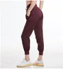 1074 Gym Sport Relaxed Lady Pantalons de yoga en vrac Femmes Workout Joggers avec Pocket Fitness Track Pants Femmes Vêtements de sport pour femmes Gym