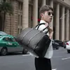Factory grossist män väska handvävda svarta handväskor klassiska vävda läder resväskor utomhus resor fitness läder handväska