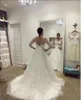 Una línea Tulle Bordado Manga larga Princesa Vestido de novia Dubai Venta Tallas grandes Frasco 2021 V Cuello Vestidos nupciales Vestidos de Noiva