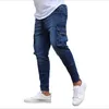 Män sträcker multi-pocket skinny jeans fick dragkedja penna byxor mode elastisk last jeans casual byxor hip hop sweatpants g0104