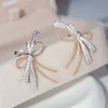 Dulce Corte Marca Joyería de Lujo 925 Plata Esterlina Pave Blanco Zafiro CZ Diamante Piedras Preciosas Fiesta Mujeres Boda Arco Stud Pendiente F2110